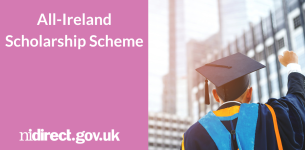 All Ireland Scholarships: A photo of a student in graduation gown and mortar board cap holding his right hand aloft in a gesture of celebration,