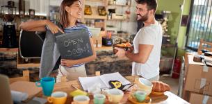 Starting Your Own Business: Image of a man an woman in a cafe.