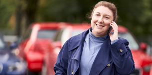 Lady talking on Mobile telephone