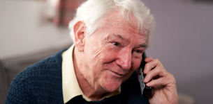 Man talking on Telephone