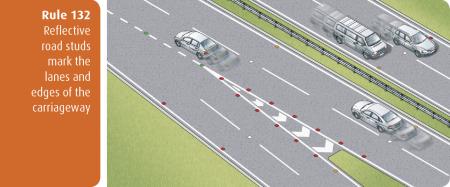 Highway Code for Northern Ireland rule 132 - reflective road studs mark the lanes and edges of the carriageway