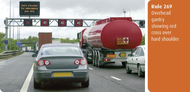  Highway Code for Northern Ireland rule 269 - overhead gantry showing red cross over hard shoulder