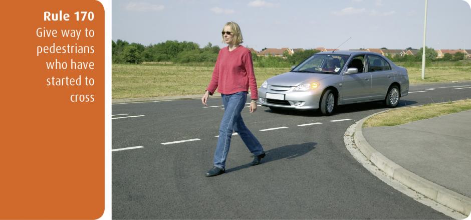 Highway Code for Northern Ireland rule 170 - give way to pedestrians who have started to cross